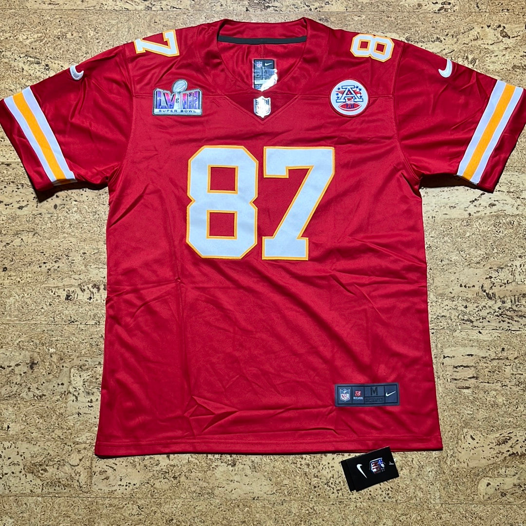Travis Kelce rouge