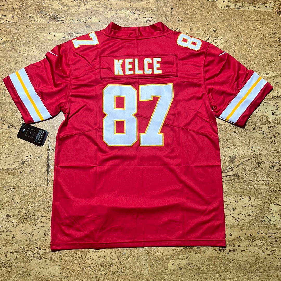 Travis Kelce rouge
