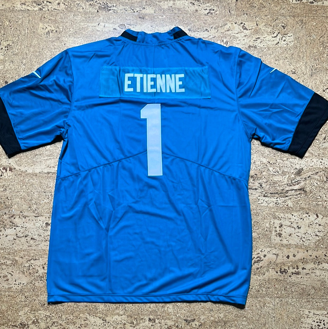 Travis Etienne vert