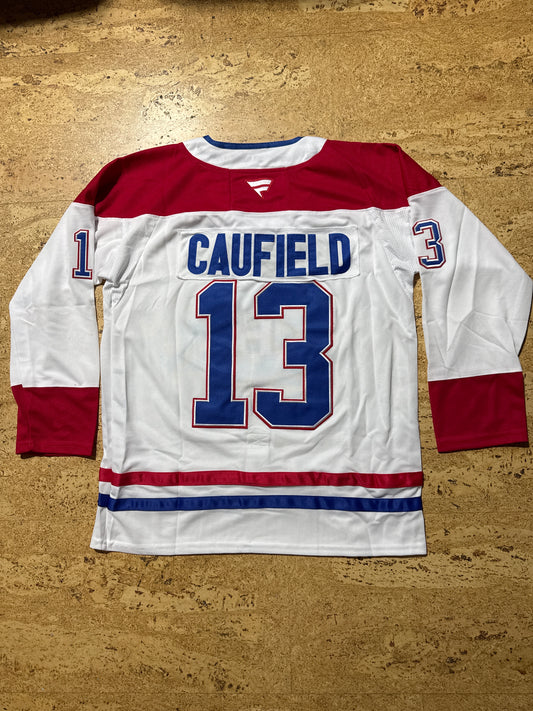 Cole Caufield blanc