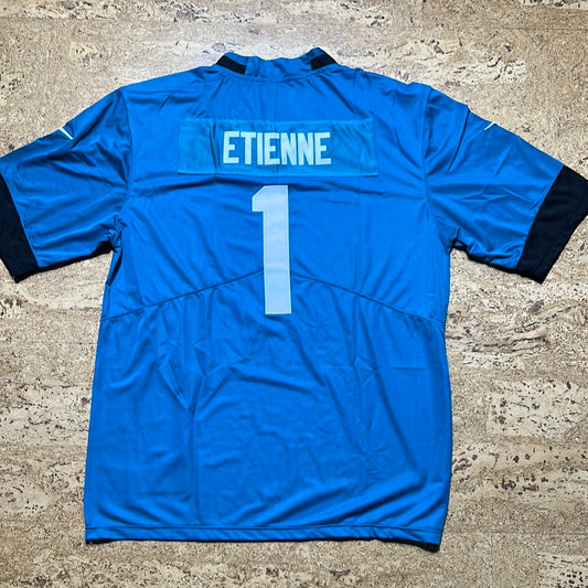 Travis Etienne vert
